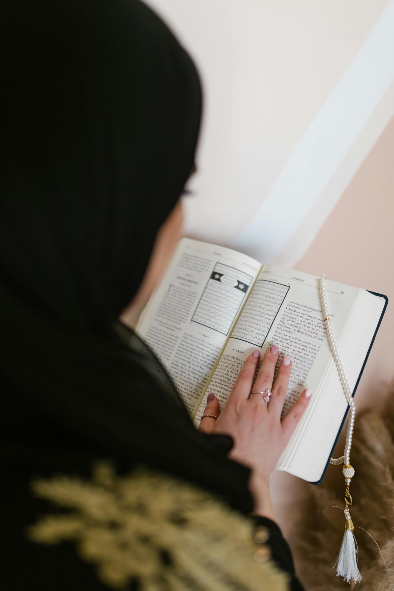 Girl reading Islamic literature 
